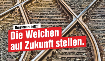 Das Foto zeigt in der Nahaufnahme sich kreuzende Bahngleise, dazu die Aufschrift "Die Weichen auf Zukunft stellen.".